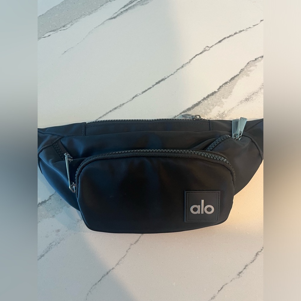 NWT ALO black explorer bag.
